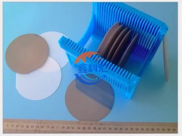 Lithium niobate wafers in a protective carrier